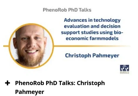 Eine Wissenschaftlerin und ein Wissenschaftler arbeiten hinter einer Glasfassade und mischen Chemikalien mit Großgeräten.